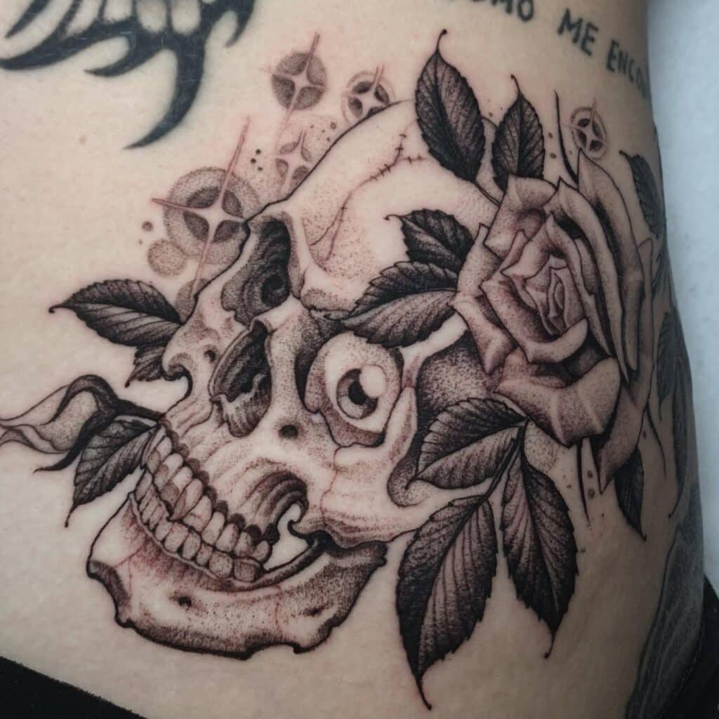 Black and white ripper tattoo.